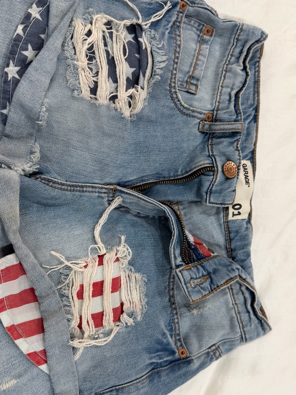 Garage Light Blue Distressed Denim Shorts with Flag Patch